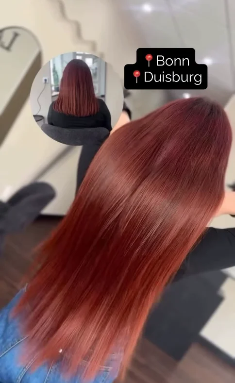 Glattes, langes kupferrotes Haar im Lasholic Studio.